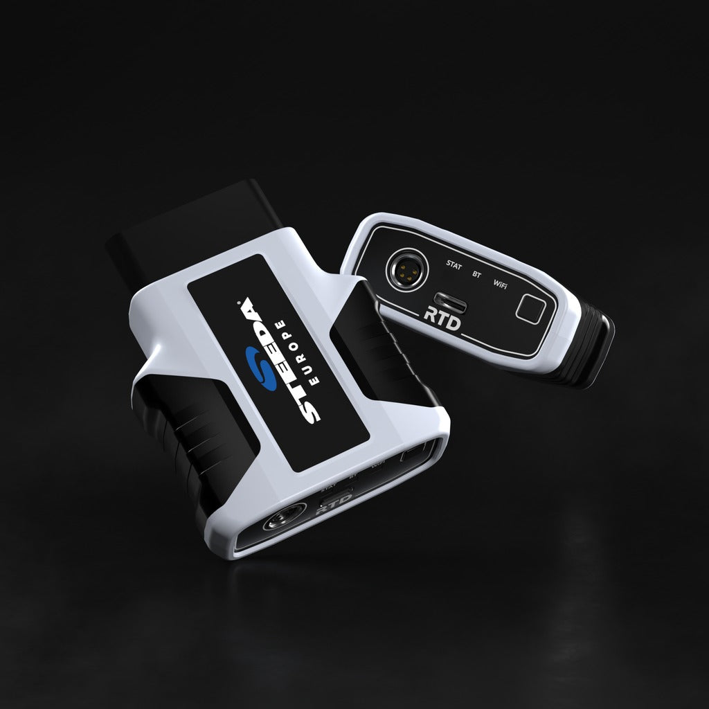 A black and silver HP Tuners OBD2 Tuner adapter (RTD) shown on a dark reflective background.